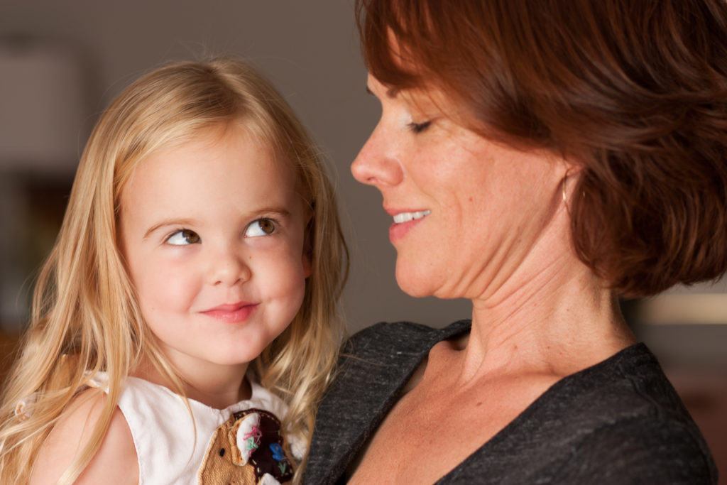 Mom and daughter looking at each other