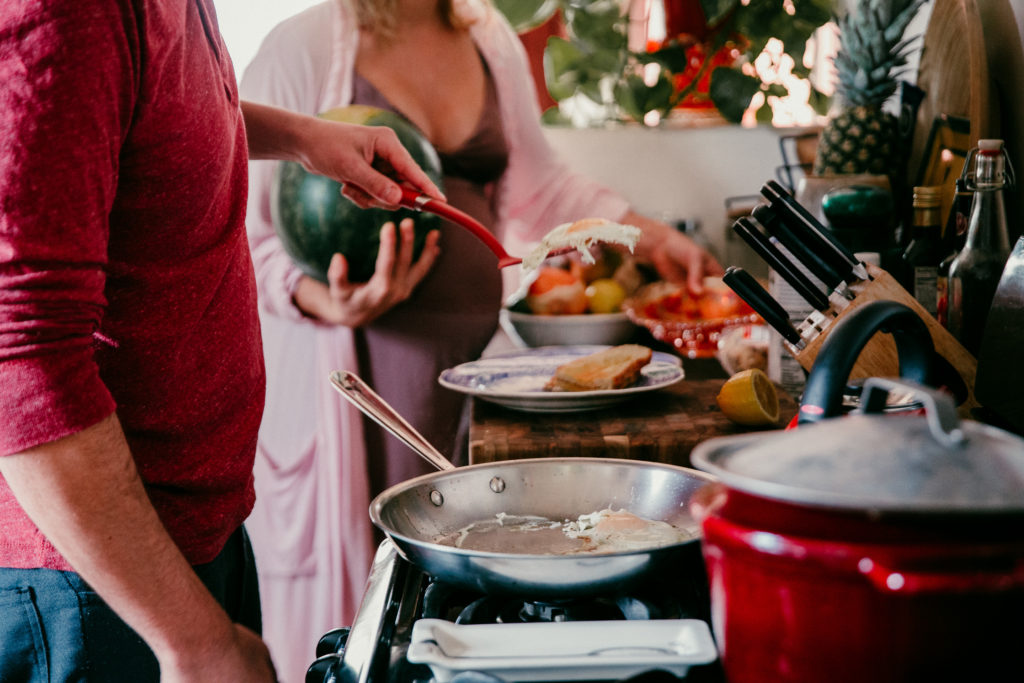 Expecting parents make breakfast in Echo Park, Los Angeles, CA