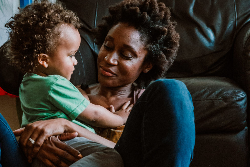 A mom holding her son - Highland Park, Los Angeles, CA