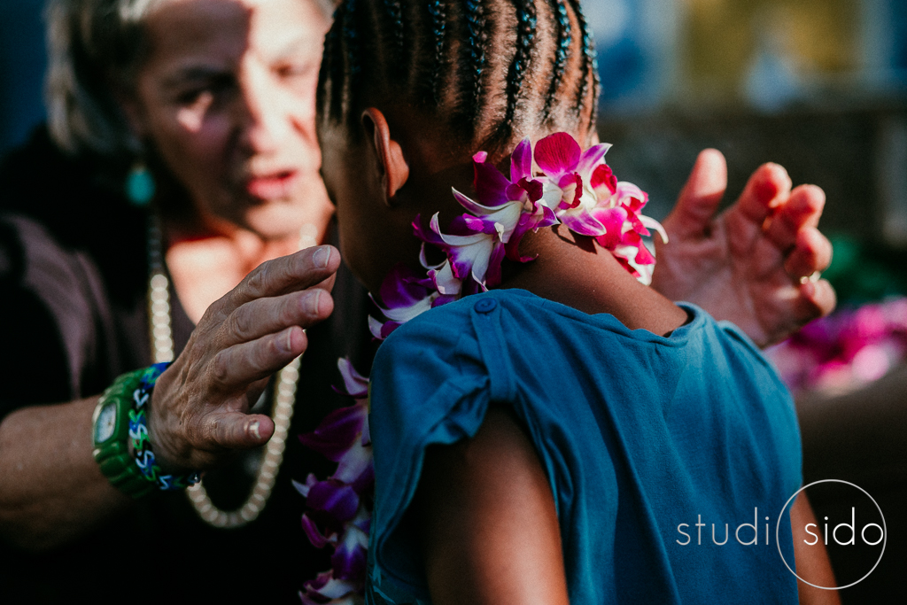 The school director puts a lei around a graduating student's neck, Echo Park, Los Angeles, CA