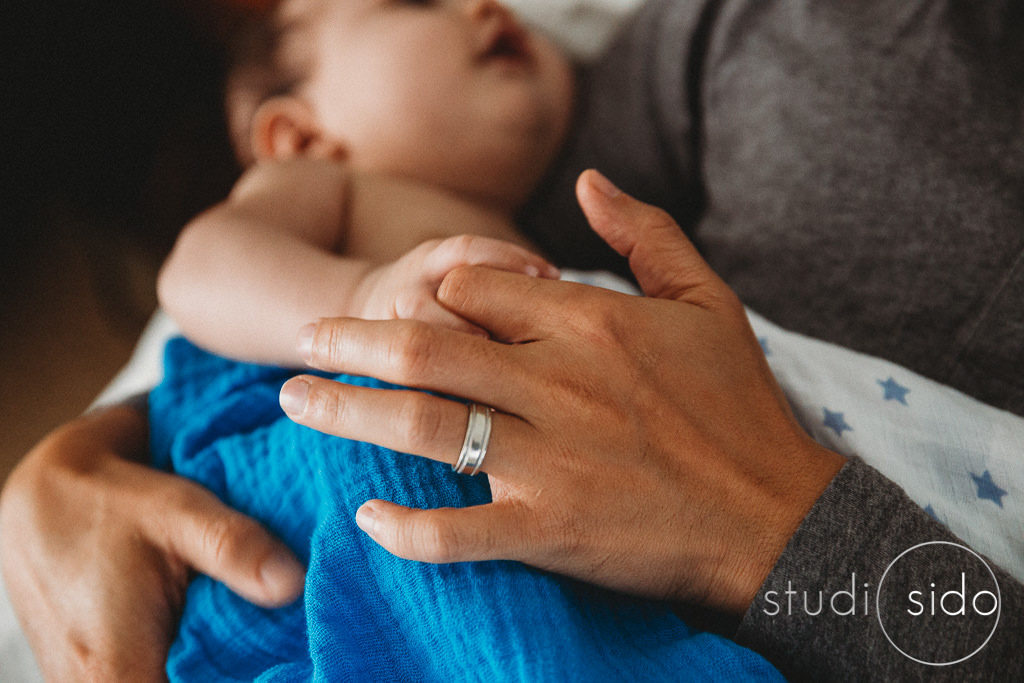 Baby holding his daddy's finger, Los Angeles, CA