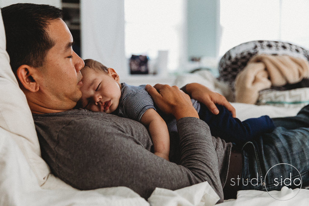 Baby sleeping on daddy's chest, Los Angeles, CA