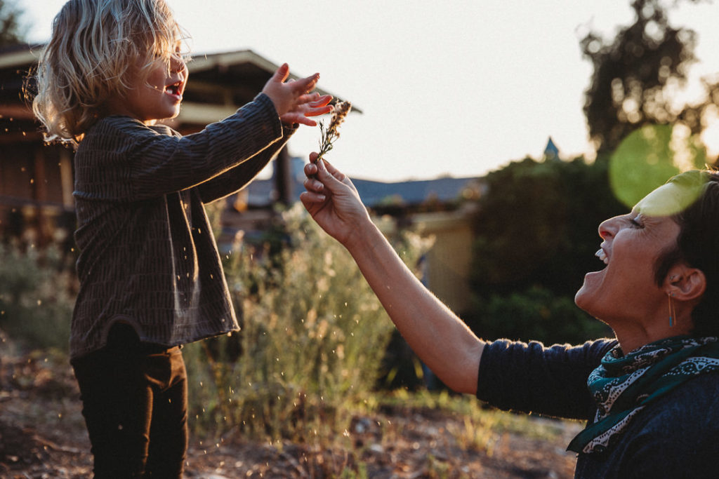 A mom and her toddler son, playing outside at sunset, Mount Washington, Los Angeles, CA