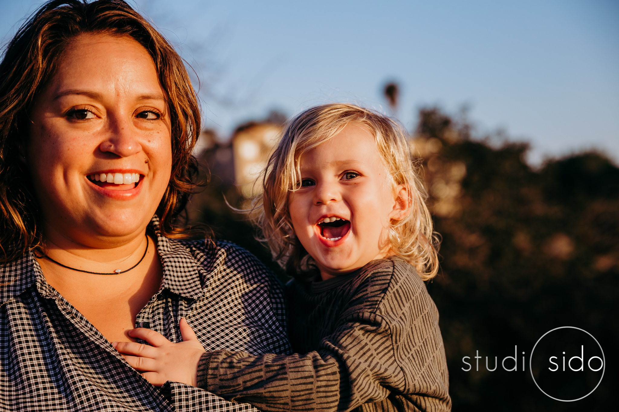 Mom and son with big smiles on their faces, Mount Washington, Los Angeles, CA