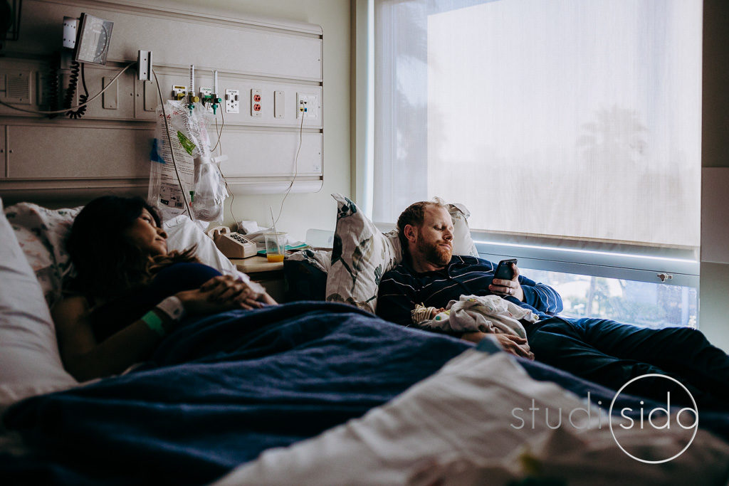 Mom and dad relax with their newborn at Kaiser Hospital in Hollywood, CA.