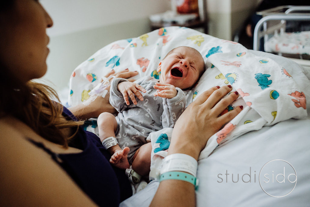 Newborn baby yawns