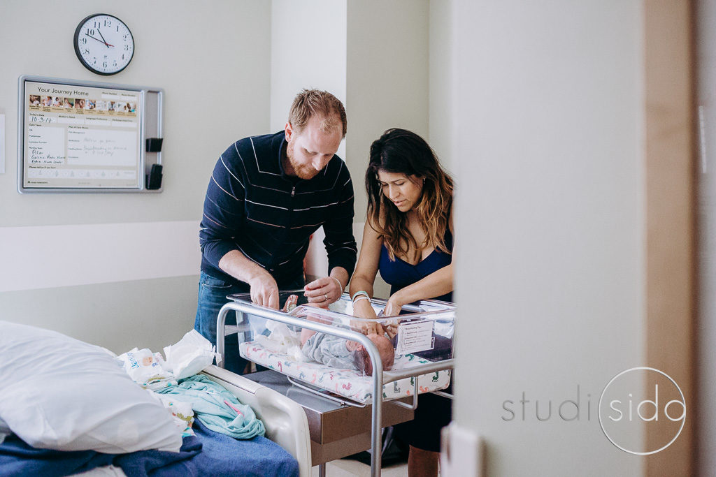 mom and dad change baby together. Fresh 48 at Kaiser Hospital Hollywood