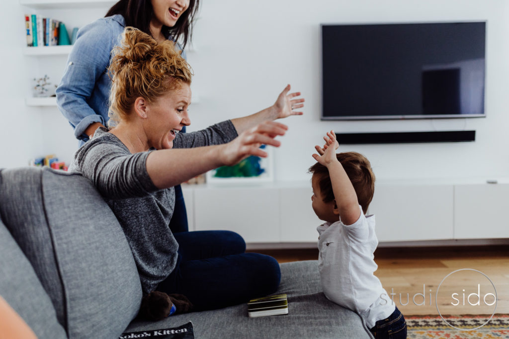 Toddler plays with his moms in their home in Los Angeles, CA