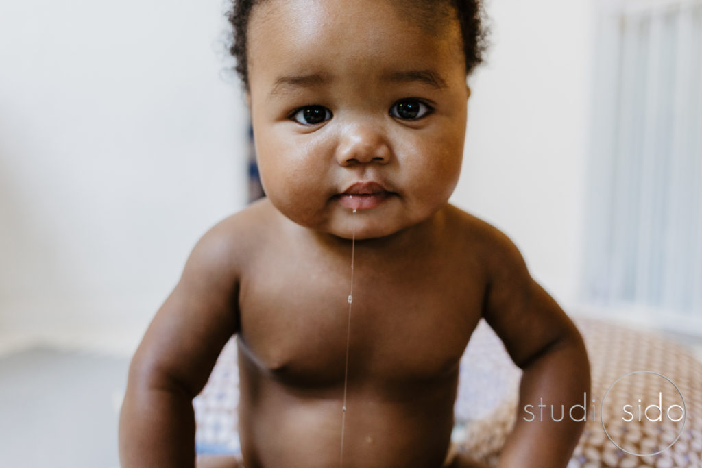 A baby drools by Los Angeles baby photographer