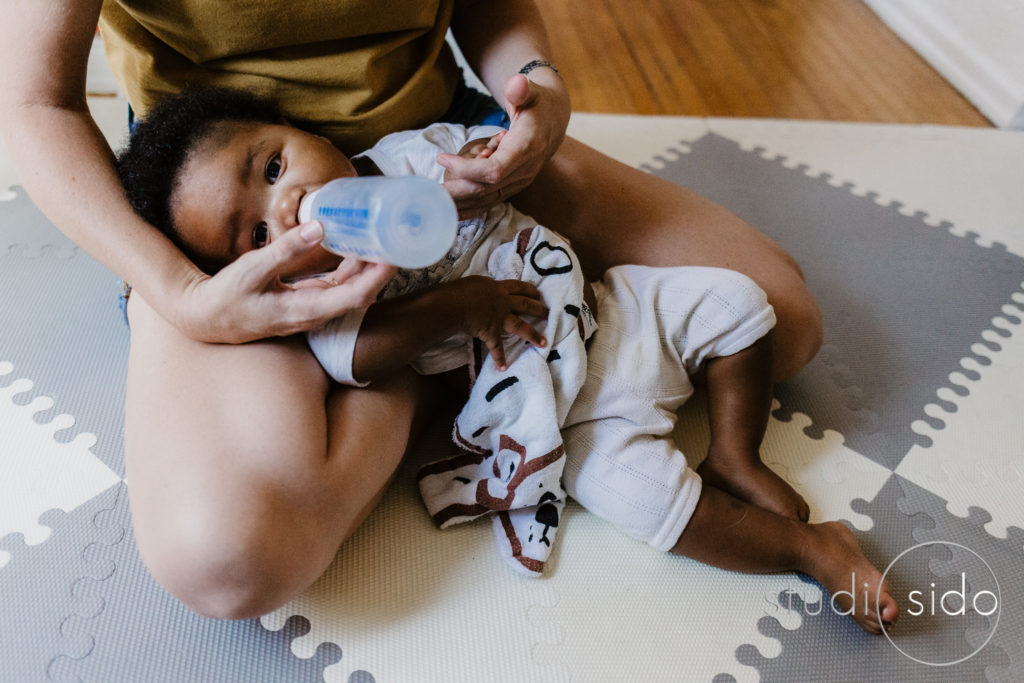 A boy drinks from a bottle, Family Photography Los Angels