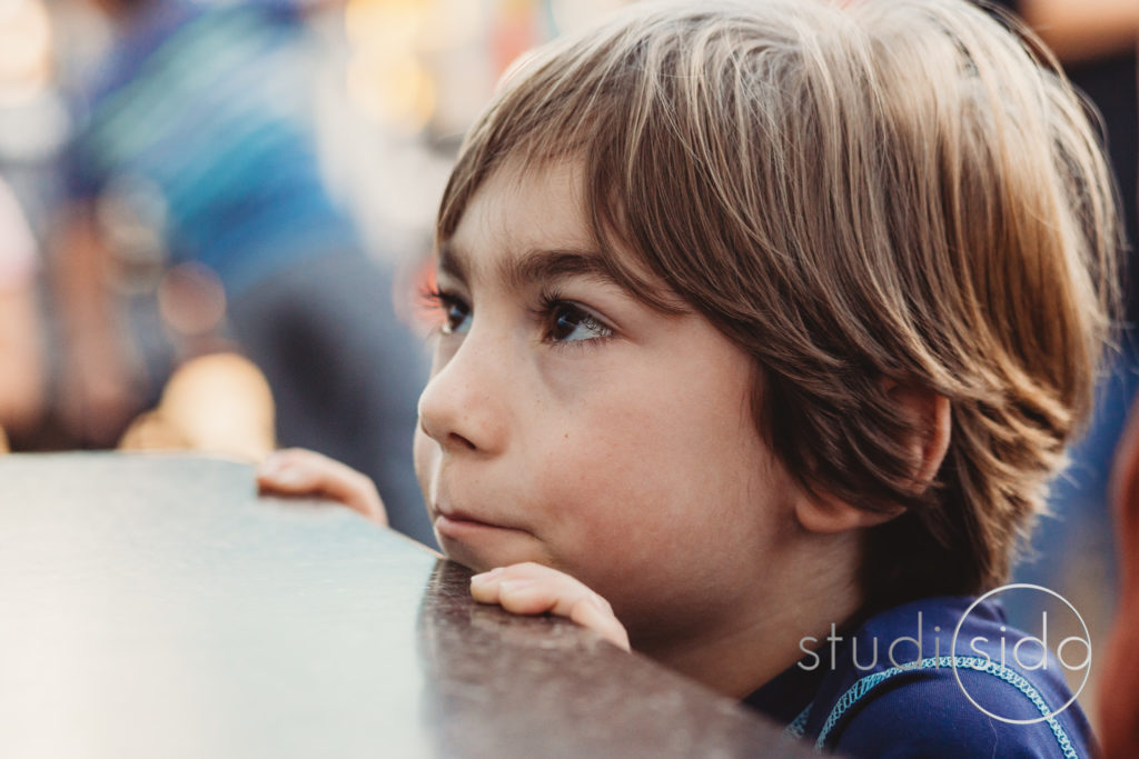 Young Boy Peering Over Counter