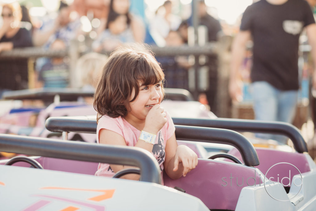 Young Girl Smirking While on Ride