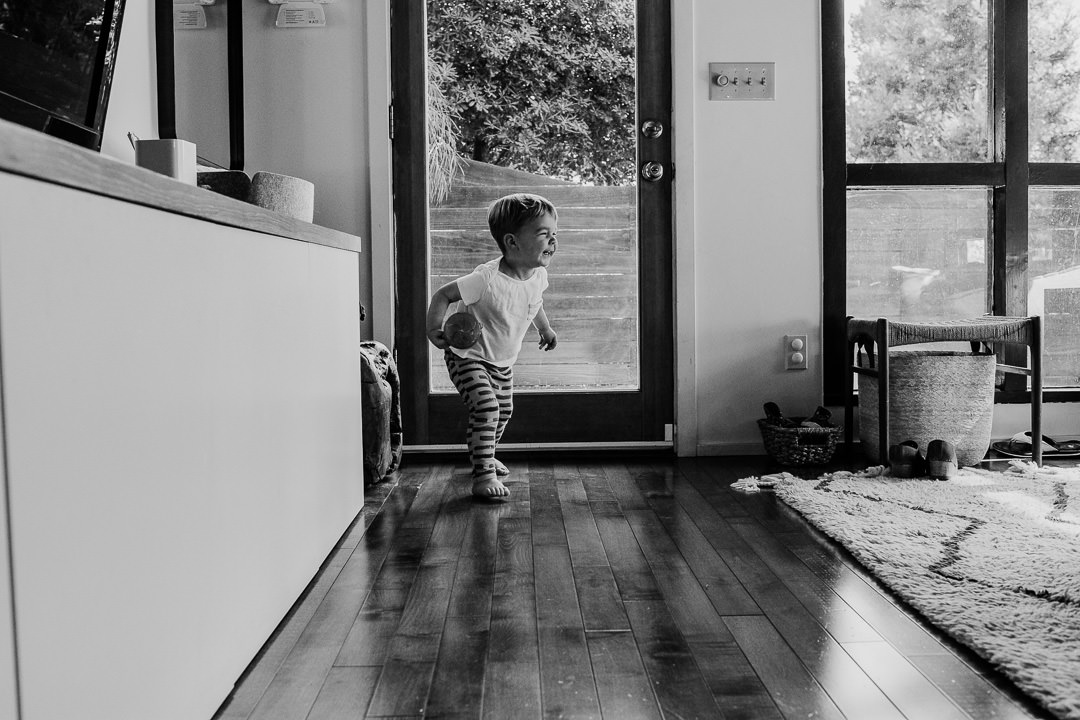 Toddler Running round House Black and White Photo