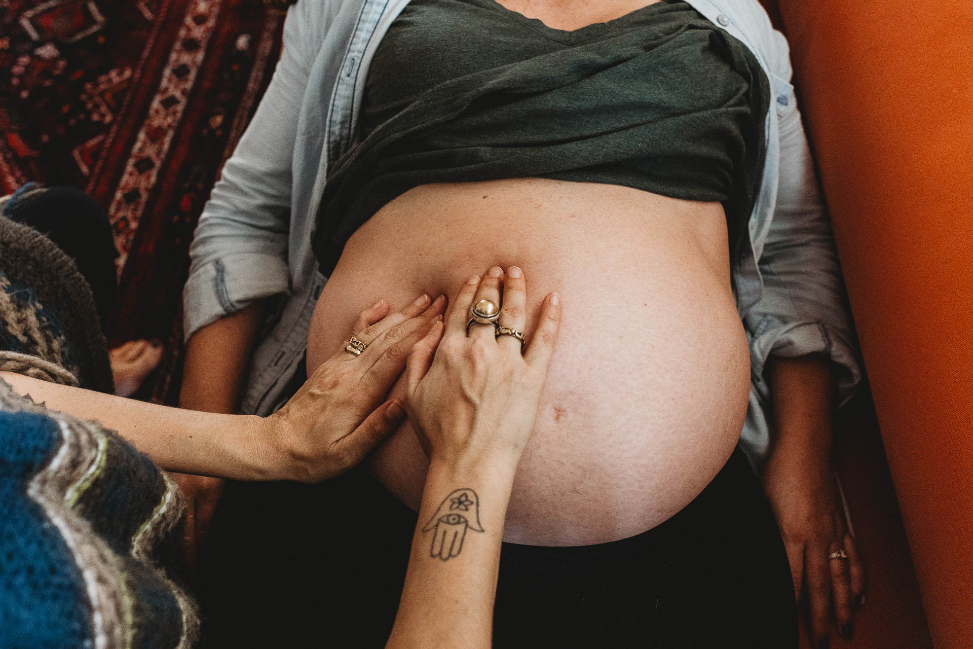 Woman Hands on Massage To Pregnant Belly