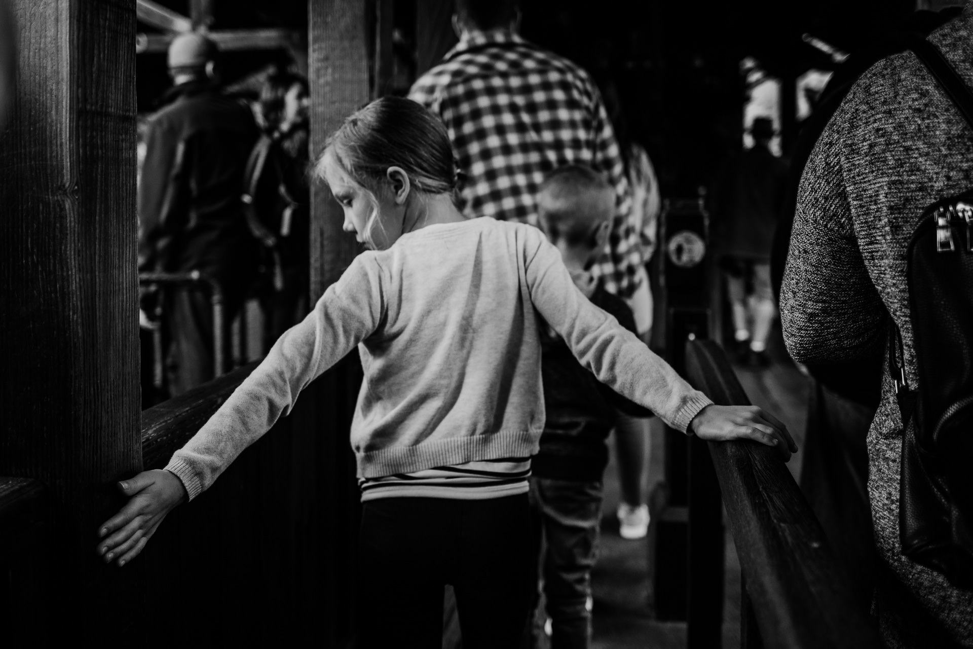 Girl waits in line to ride Thunder Mountain at Disneyland