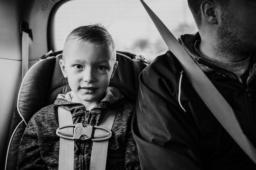 Boy rides in car on the way to Disneyland