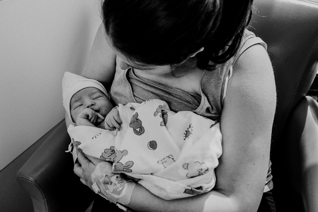 Mom Holding Newborn Baby In Hospital Black and White Photo