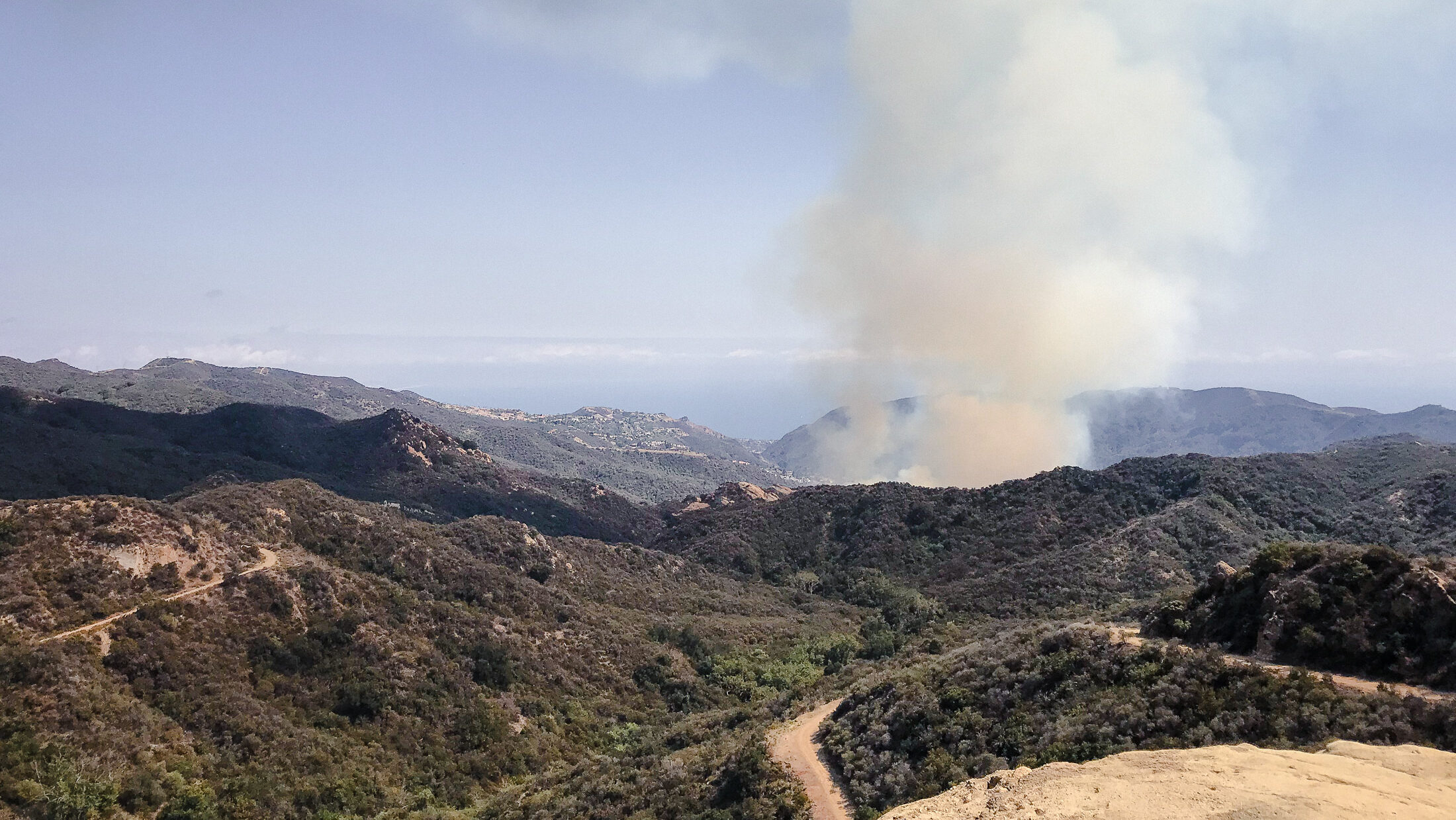 A wildfire burns in Topanga Canyon, CA