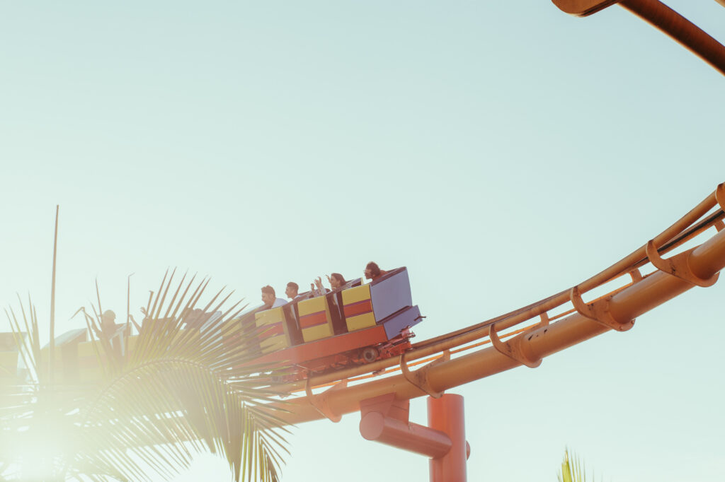 A family riding the roller coaster on the Santa Monica Pier