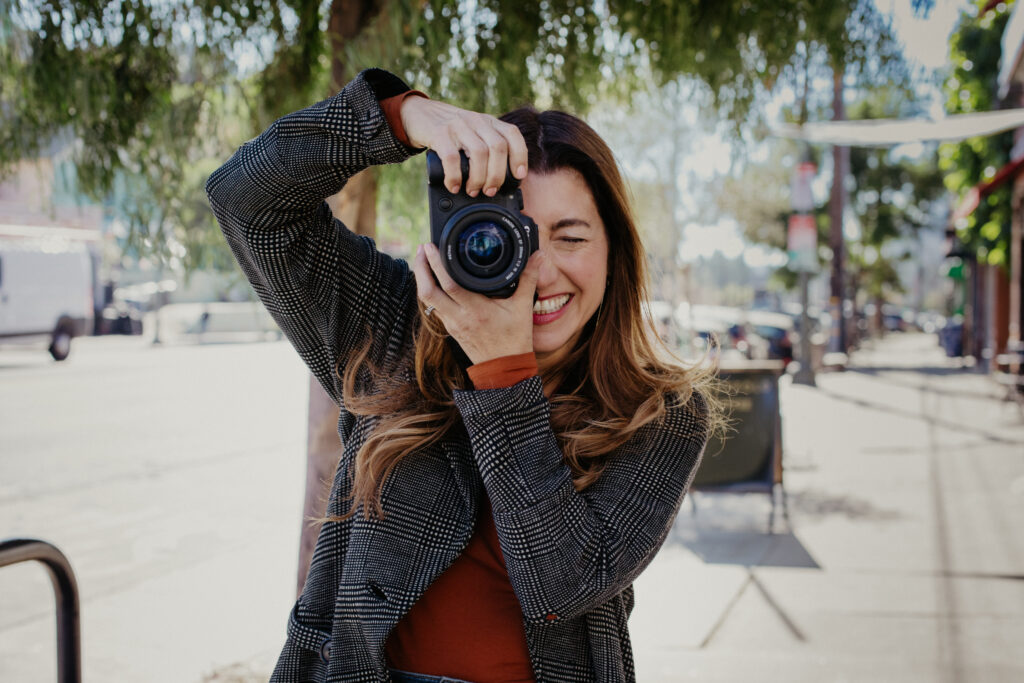 sarah sido holding camera