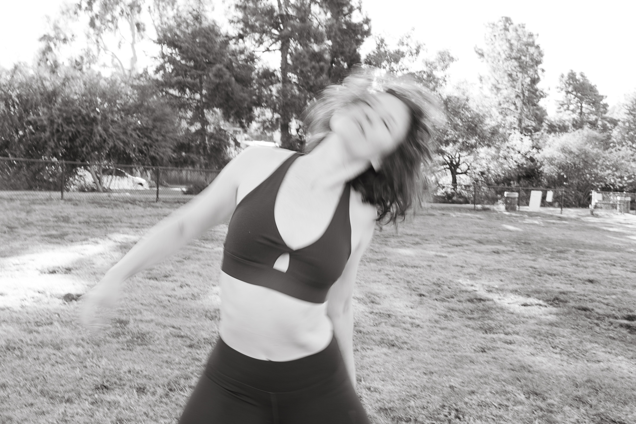 Birdsong Fitness Brand Photos Woman Dancing Outside Black and White Photo