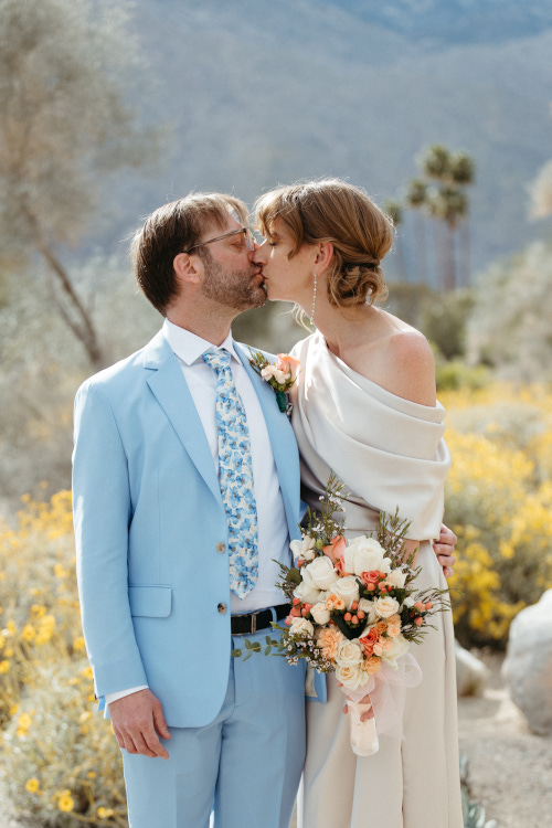 Bride and Groom kissing at wedding in Palm Springs, California